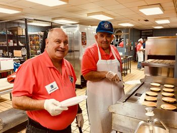 Kiwanis members handle the Pancake Day