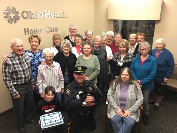 Hospice volunteers gather for a photo on National Law Enforcement Day.