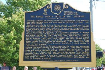 A historical marker describes the Trial of Bill Anderson and its significance.