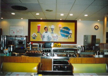 The Isaly Shoppe on Mt. Vernon Avenue had the feel of a 1950s’s diner. Behind the booths, the kitchen is visible with soft serve machines, bananas, a microwave, and more. 