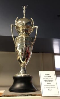 A tall gold trophy