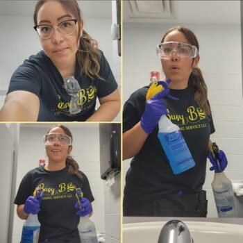 Ana is a Latino woman with long light brough hair in a pony tail. She is wearing glasses covered with safety goggles and gloves. She holds two spray bottles.
