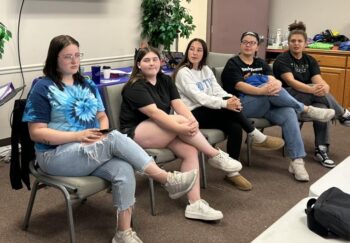 5 teens talk on a panel.