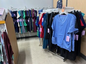 Racks of scrubs at Here Today